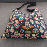 Bolso hobo recto de corazones mexicanos